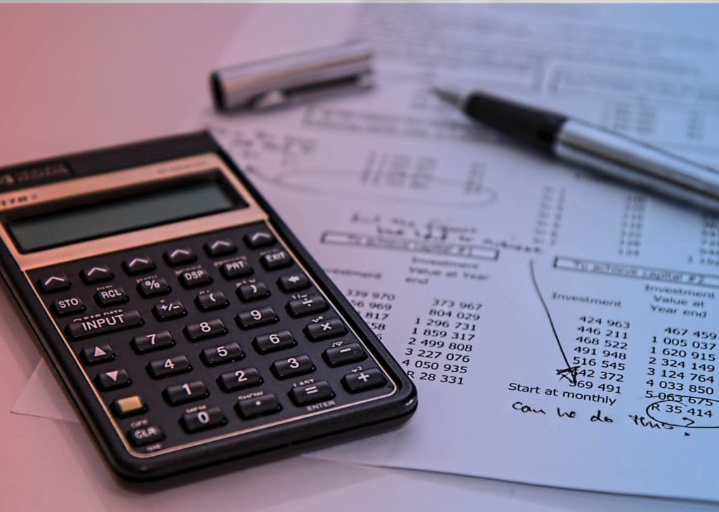 Calculator and sheet with numbers